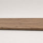Custom round-nose stair tread made from A&A Surfaces Forrest Brown flooring. Round profile. Full view.