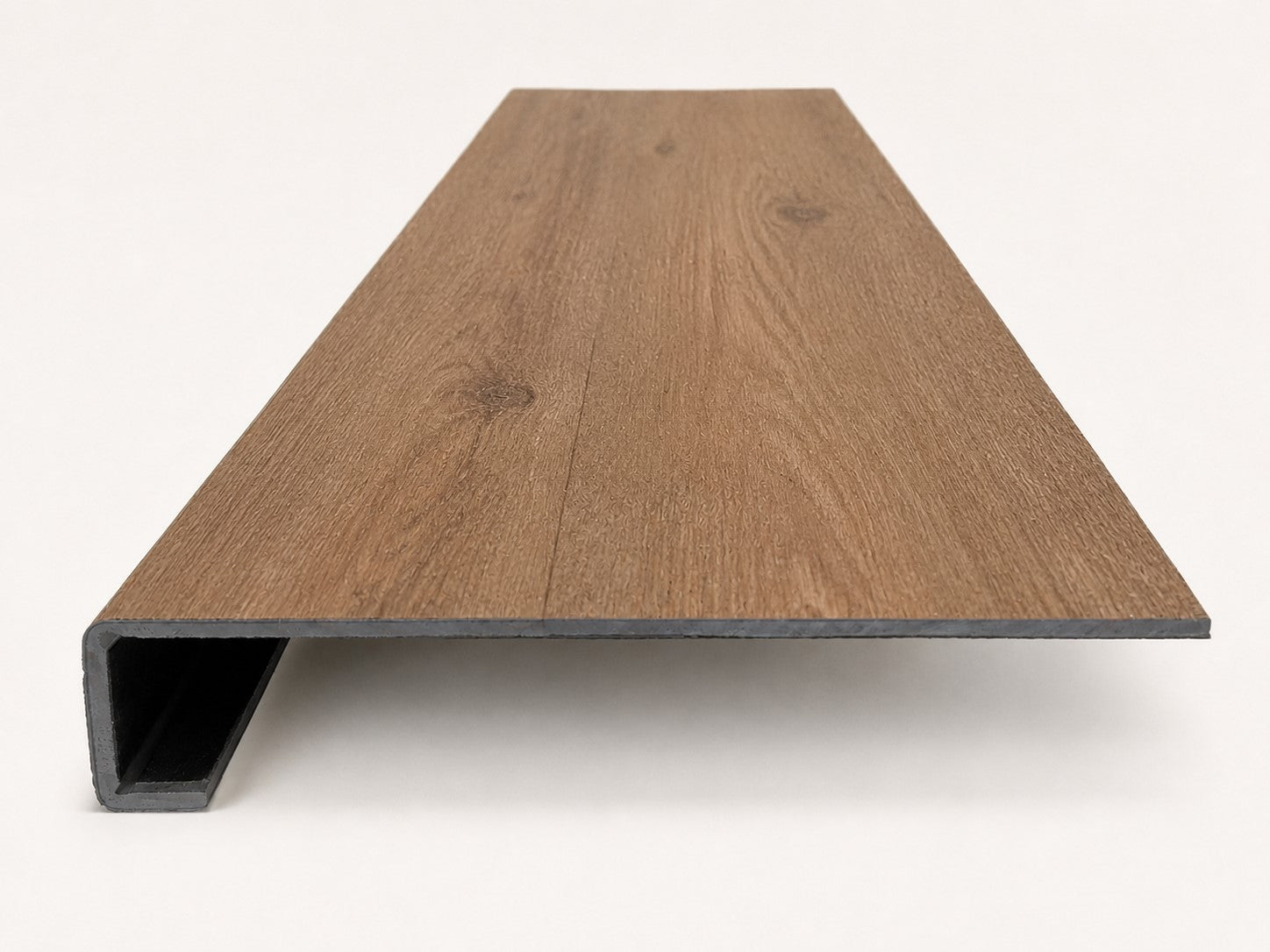 Custom square-nose stair tread made from A&A Surfaces Forrest Brown flooring. Square profile. Front view.
