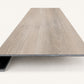 Custom square-nose stair tread made from DuraLux Performance Highguard Silver flooring. Square profile. Front view.