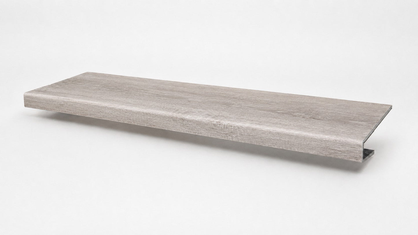 Custom square-nose stair tread made from DuraLux Performance Highguard Silver flooring. Square profile. Full view.