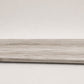 Custom round-nose stair tread made from DuraLux Performance Highguard Silver flooring. Round profile. Full view.