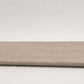 Custom round-nose stair tread made from DuraLux Performance Lorraine Sienna flooring. Round profile. Full view.