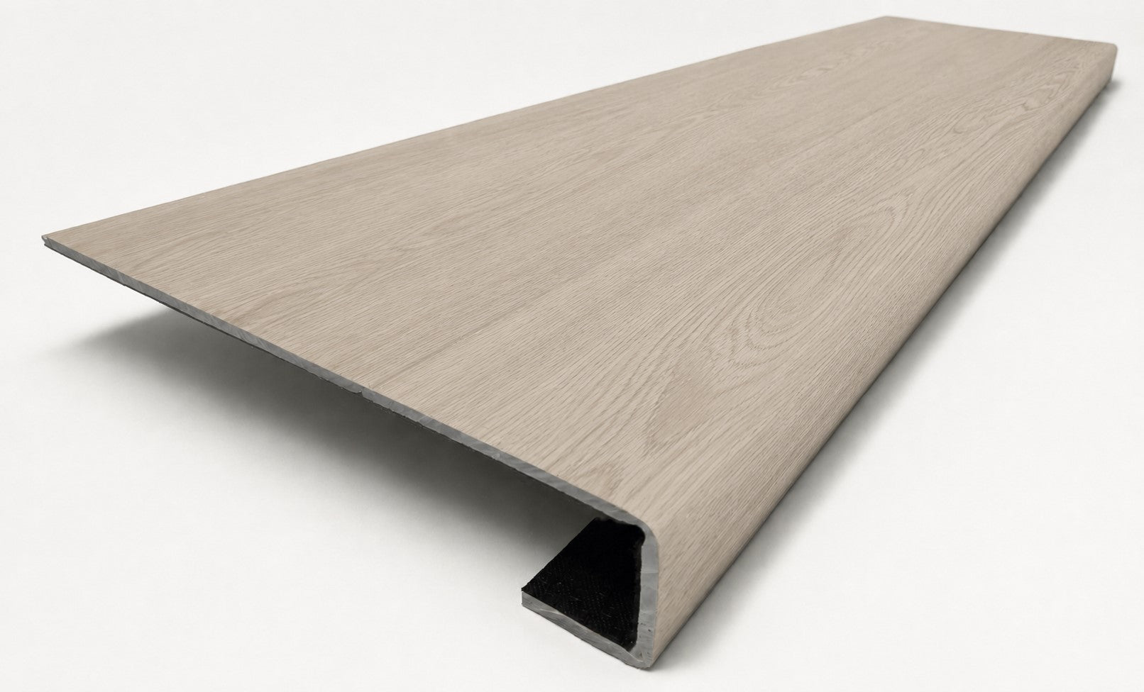 Custom square-nose stair tread made from DuraLux Performance Lorraine Sienna flooring. Square profile. Angled view.