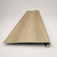 Custom round-nose stair tread made from DuraLux Performance Paisley Cape flooring. Round profile. Front view.