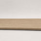 Custom round-nose stair tread made from DuraLux Performance Paisley Cape flooring. Round profile. Full view.
