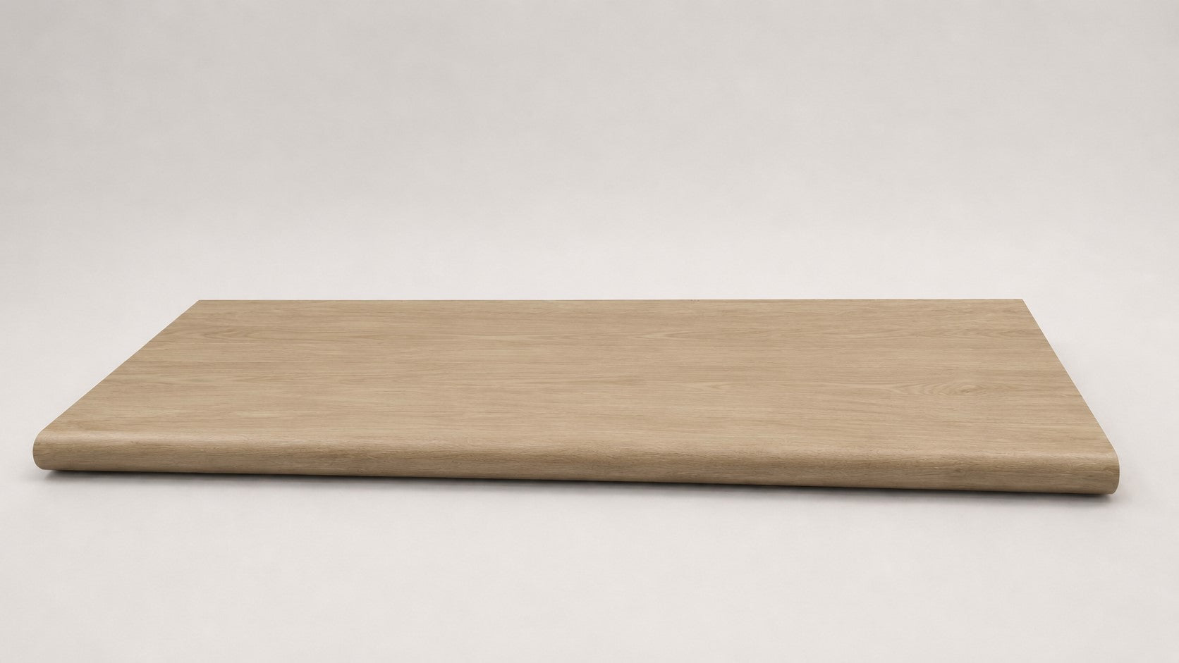 Custom round-nose stair tread made from DuraLux Performance Paisley Cape flooring. Round profile. Full view.