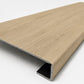 Custom square-nose stair tread made from DuraLux Performance Paisley Cape flooring. Square profile. Angled view.