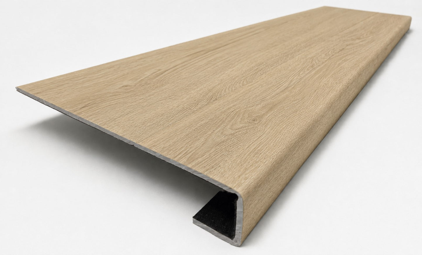 Custom square-nose stair tread made from DuraLux Performance Paisley Cape flooring. Square profile. Angled view.