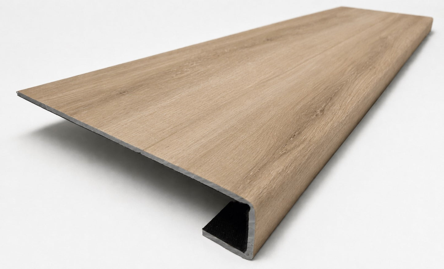 Custom square-nose stair tread made from DuraLux Performance Piedmont Bend flooring. Square profile. Angled view.