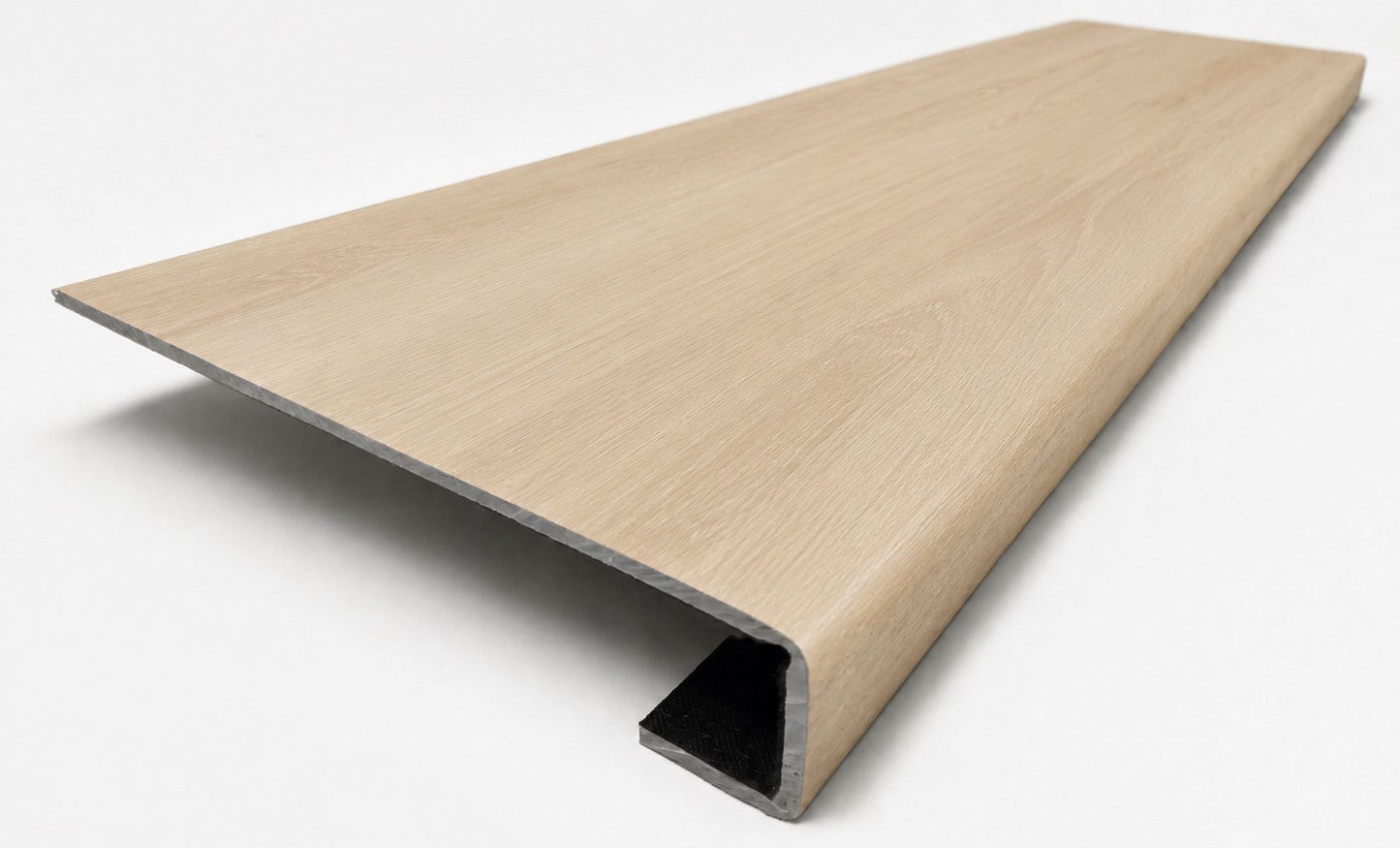 Custom square-nose stair tread made from DuraLux Performance Poplar Trace flooring. Square profile. Angled view.