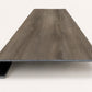 Custom square-nose stair tread made from DuraLux Performance Stormy Elm flooring. Square profile. Front view.