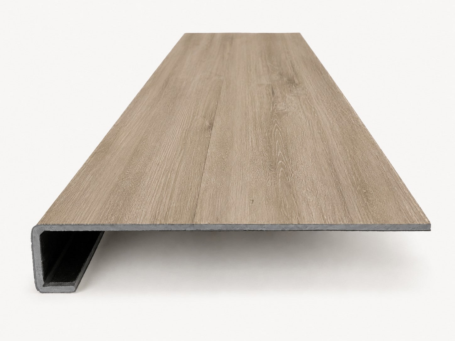Custom square-nose stair tread made from DuraLux Performance Timber Saddle flooring. Square profile. Front view.