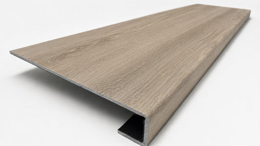 Custom square-nose stair tread made from DuraLux Performance Timber Saddle flooring. Square profile. Angled view.