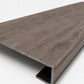 Custom square-nose stair tread made from DuraLux Performance Winter Peak flooring. Square profile. Angled view.
