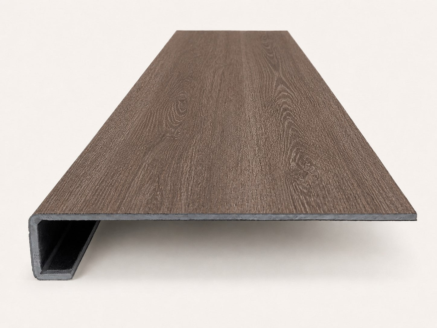 Custom square-nose stair tread made from DuraLux Performance Winter Peak flooring. Square profile. Front view.