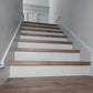 Finished MDF stair riser painted white, shown as a completed example of a ready-to-install stair component.