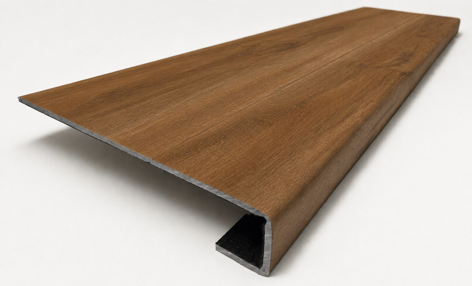 Custom square-nose stair tread made to match LifeProof Butler Hickory flooring. Square profile. Angled view.