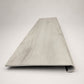 Custom round-nose stair tread made from LifeProof Chiffon Lace flooring. Round profile. Front view.
