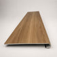 Custom round-nose stair tread made from LifeProof Clermont Elm flooring. Round profile. Front view.