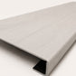 Custom square-nose stair tread made from LifeProof Driftwood Beach Oak flooring. Square profile. Angled view.