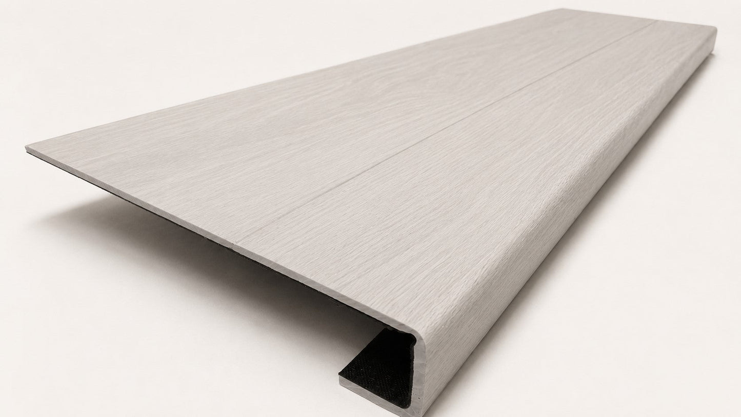 Custom square-nose stair tread made from LifeProof Driftwood Beach Oak flooring. Square profile. Angled view.