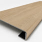 Custom square-nose stair tread made from LifeProof Dusk Cherry flooring. Square profile. Angled view.