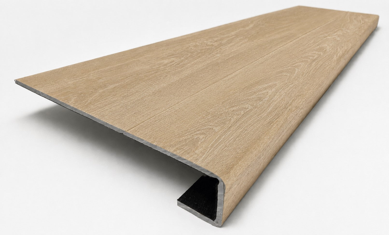 Custom square-nose stair tread made from LifeProof Dusk Cherry flooring. Square profile. Angled view.