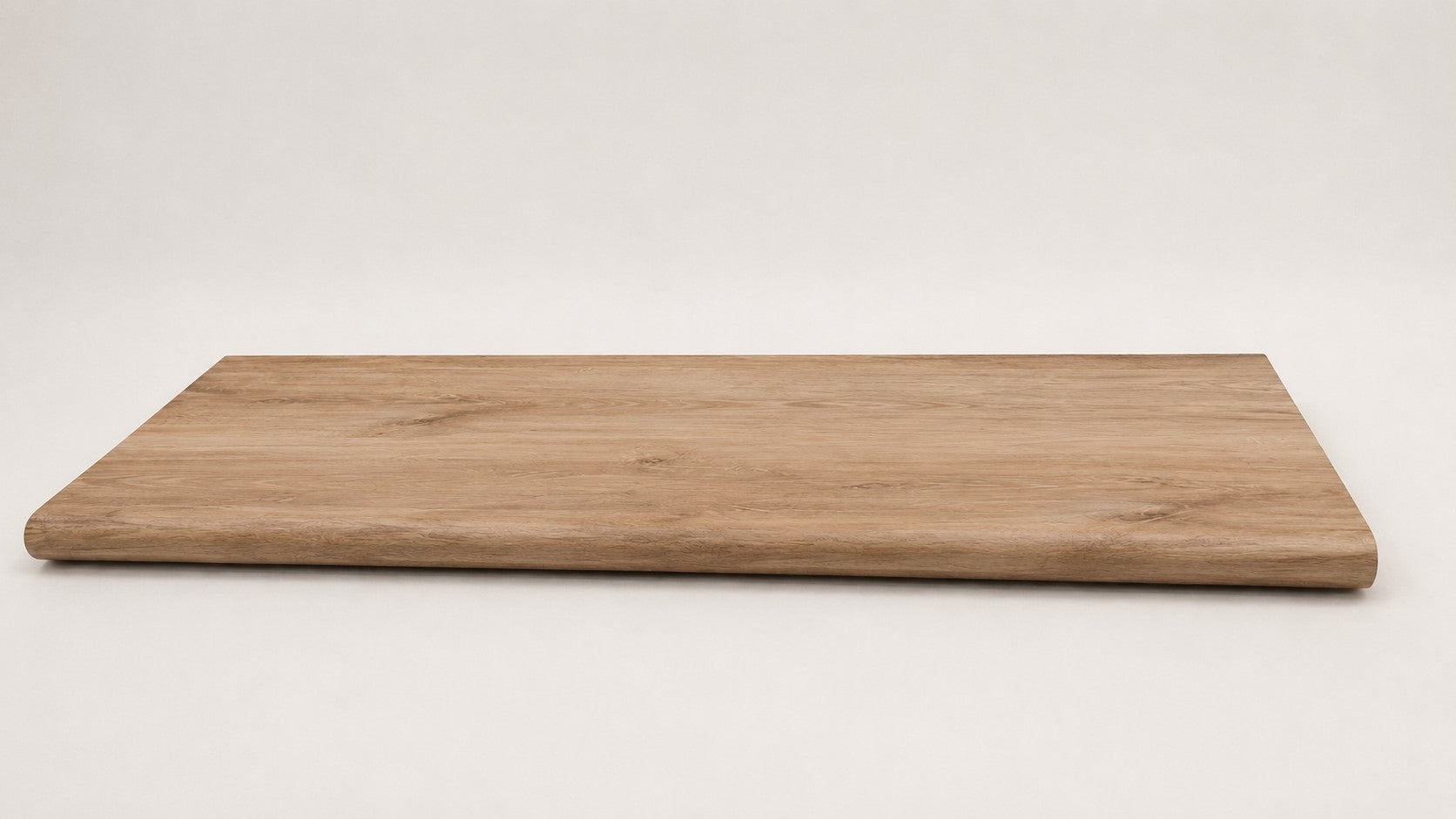 Custom round-nose stair tread made from LifeProof Fresh Oak flooring. Round profile. Full view.