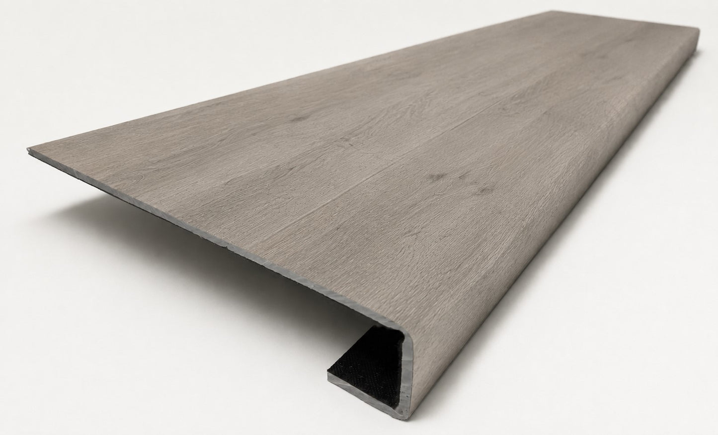 Custom square-nose stair tread made from LifeProof Kacee Canyon Oak flooring. Square profile. Angled view.