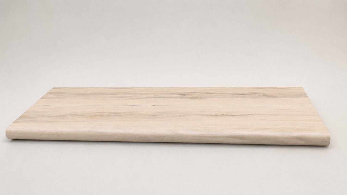 Custom round-nose stair tread made from LifeProof Navarra Maple Oak flooring. Round profile. Full view.