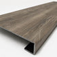 Custom square-nose stair tread made to match LifeProof Restored Wood flooring. Square profile. Angled view.