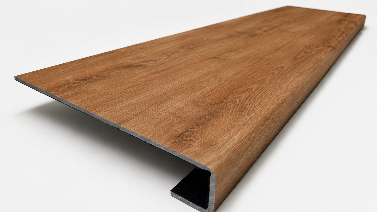 Custom square-nose stair tread made from LifeProof Trail Oak flooring. Square profile. Angled view.