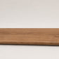 Custom round-nose stair tread made from LifeProof Trail Oak flooring. Round profile. Full view.