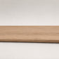 Custom round-nose stair tread made to match LifeProof Westminster Oak flooring. Round profile. Full view.