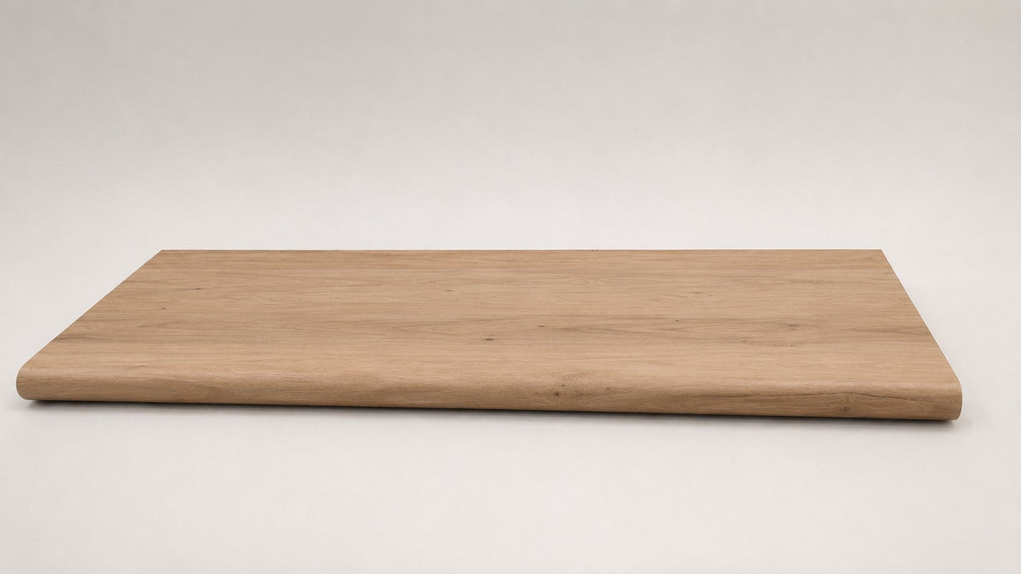 Custom round-nose stair tread made to match LifeProof Westminster Oak flooring. Round profile. Full view.
