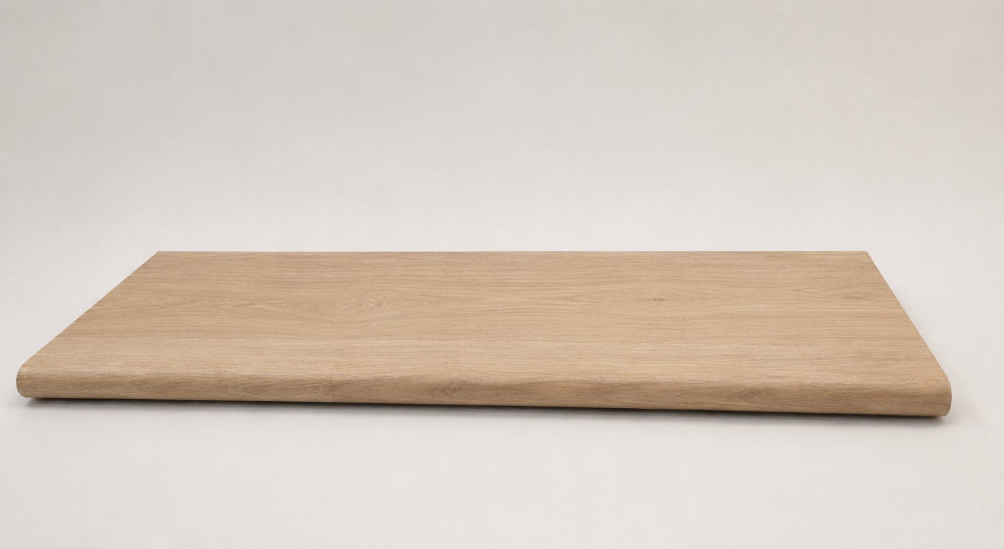 Custom round-nose stair tread made to match NuCore Caracal Crossing flooring. Round profile. Full view.