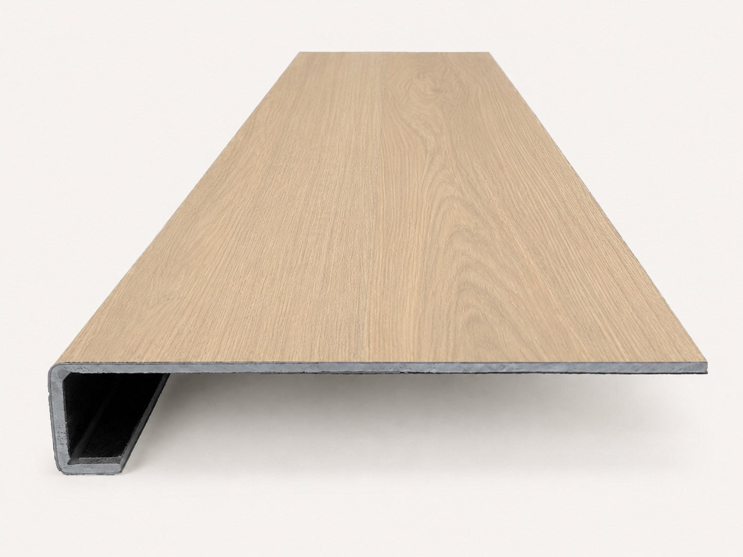 Custom square-nose stair tread made to match NuCore Caracal Crossing flooring. Square profile. Front view.