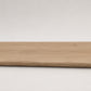Custom round-nose stair tread made from NuCore Cedar Point flooring. Round profile. Full view.