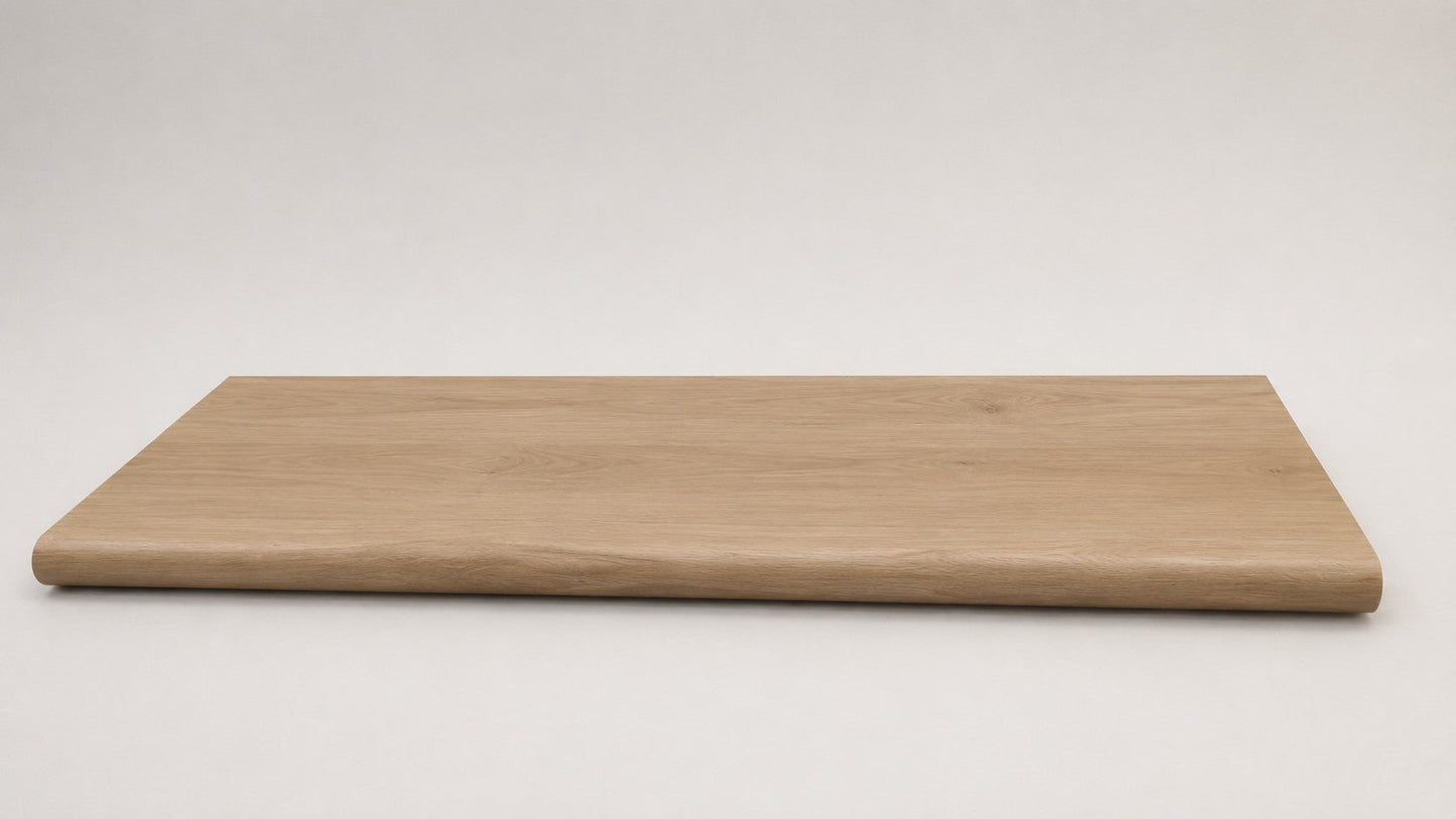 Custom round-nose stair tread made from NuCore Cedar Point flooring. Round profile. Full view.