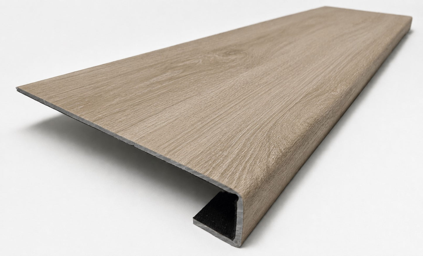 Custom square-nose stair tread made to match NuCore Deerfield Grove flooring. Square profile. Angled view.