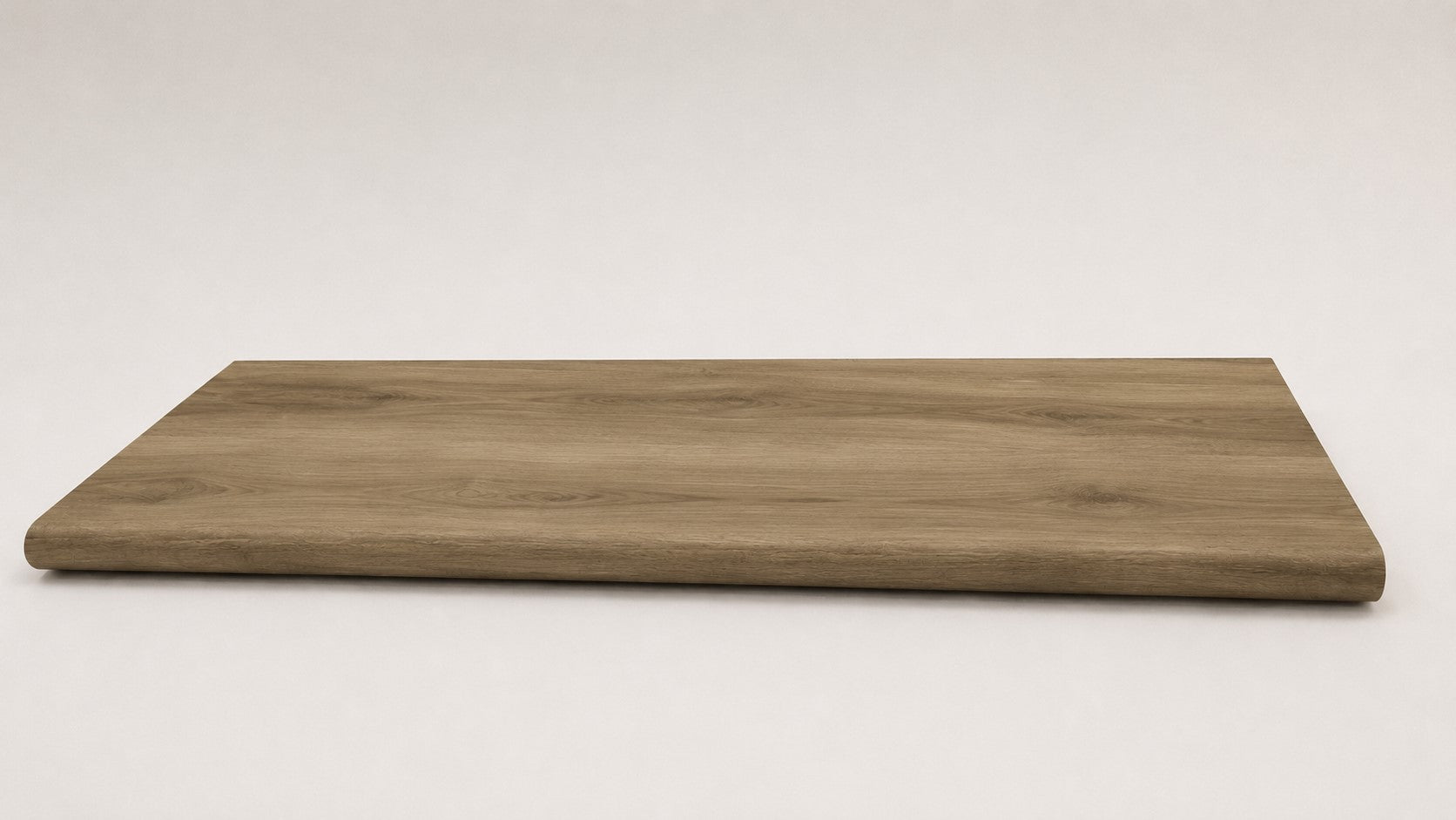 Custom round-nose stair tread made from NuCore Everwood Falls flooring. Round profile. Full view.