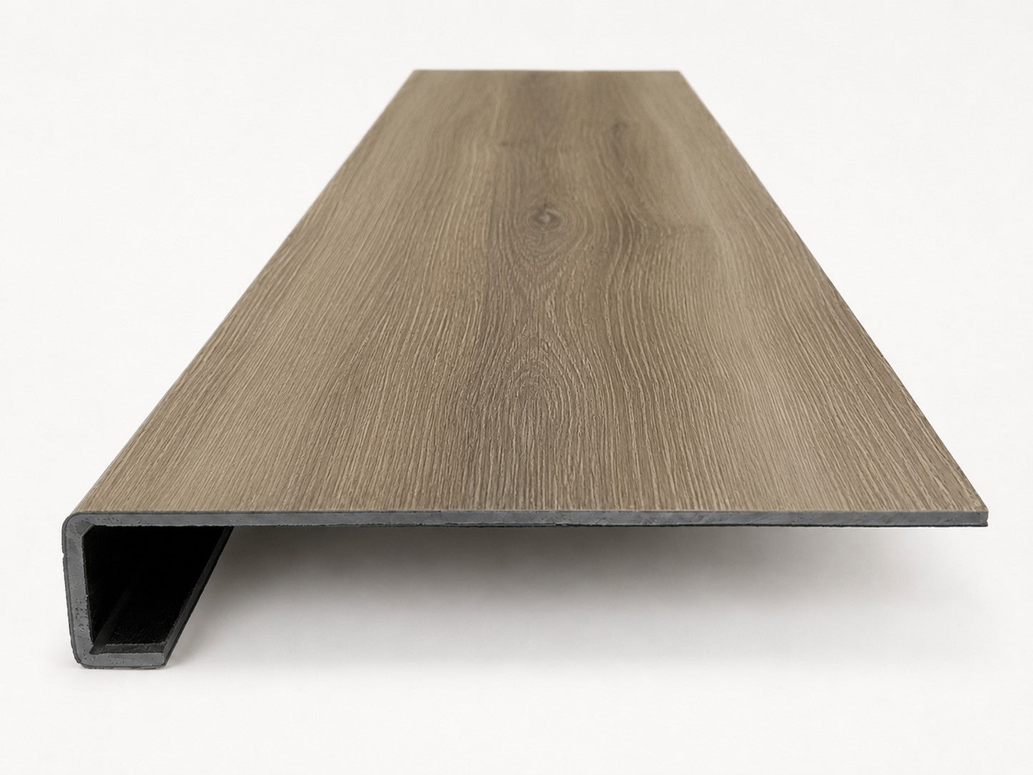 Custom square-nose stair tread made from NuCore Everwood Falls flooring. Square profile. Front view.