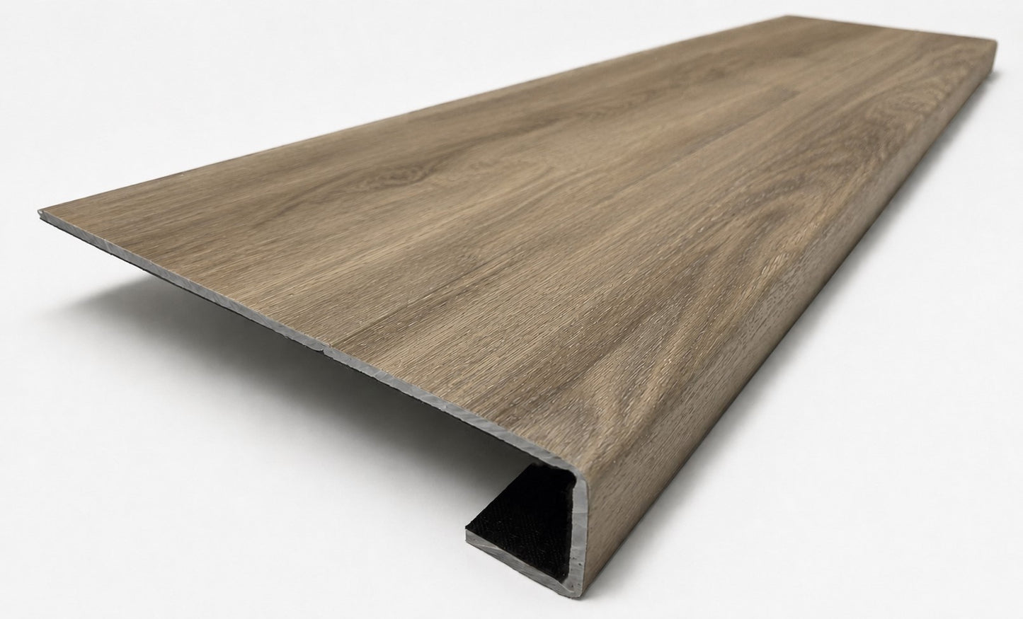 Custom square-nose stair tread made from NuCore Everwood Falls flooring. Square profile. Angled view.