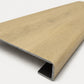 Custom square-nose stair tread made to match NuCore Fairborn Blonde flooring. Square profile. Angled view.