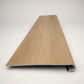 Custom round-nose stair tread made from NuCore Glenridge Oak flooring. Round profile. Front view.