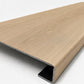 Custom square-nose stair tread made from NuCore Nordic Oak flooring. Square profile. Angled view.