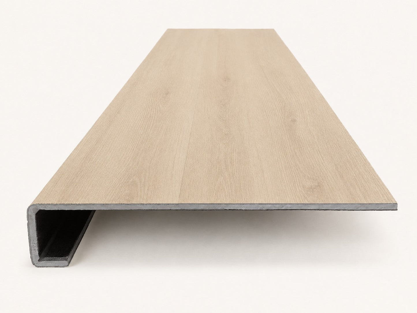 Custom square-nose stair tread made from NuCore Sandbank Point flooring. Square profile. Front view.