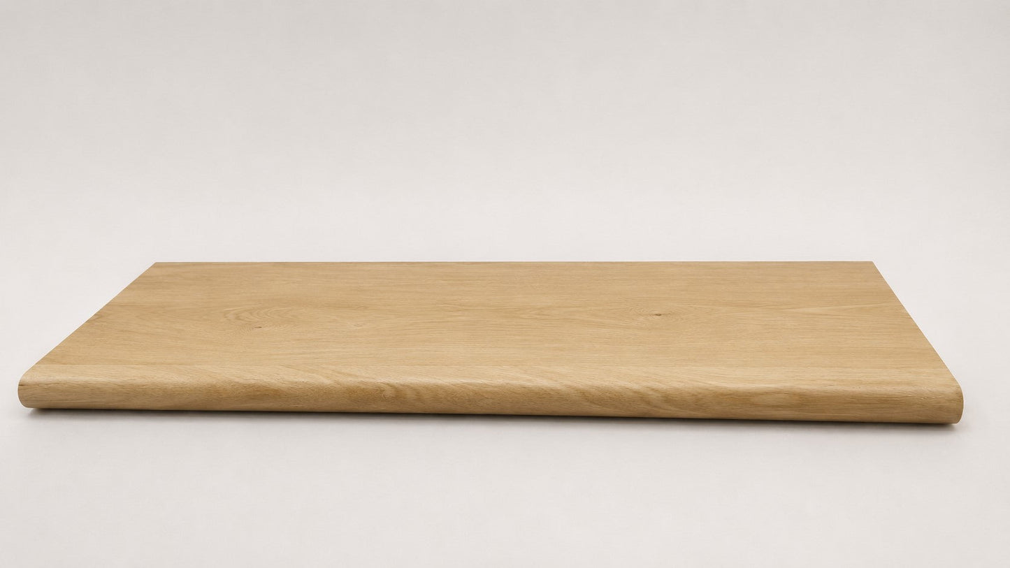 Custom round-nose stair tread made from NuCore Oakleigh Blonde flooring. Round profile. Full view.