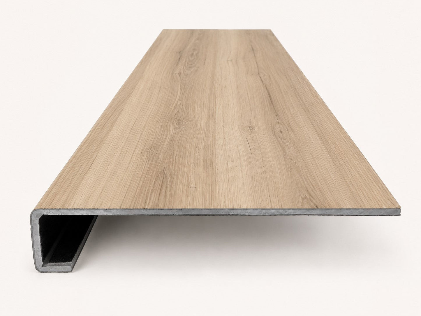 Custom square-nose stair tread made to match NuCore Turner Road flooring. Square profile. Front view.