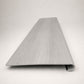 Custom round-nose stair tread made from NuCore Wisteria flooring. Round profile. Front view.